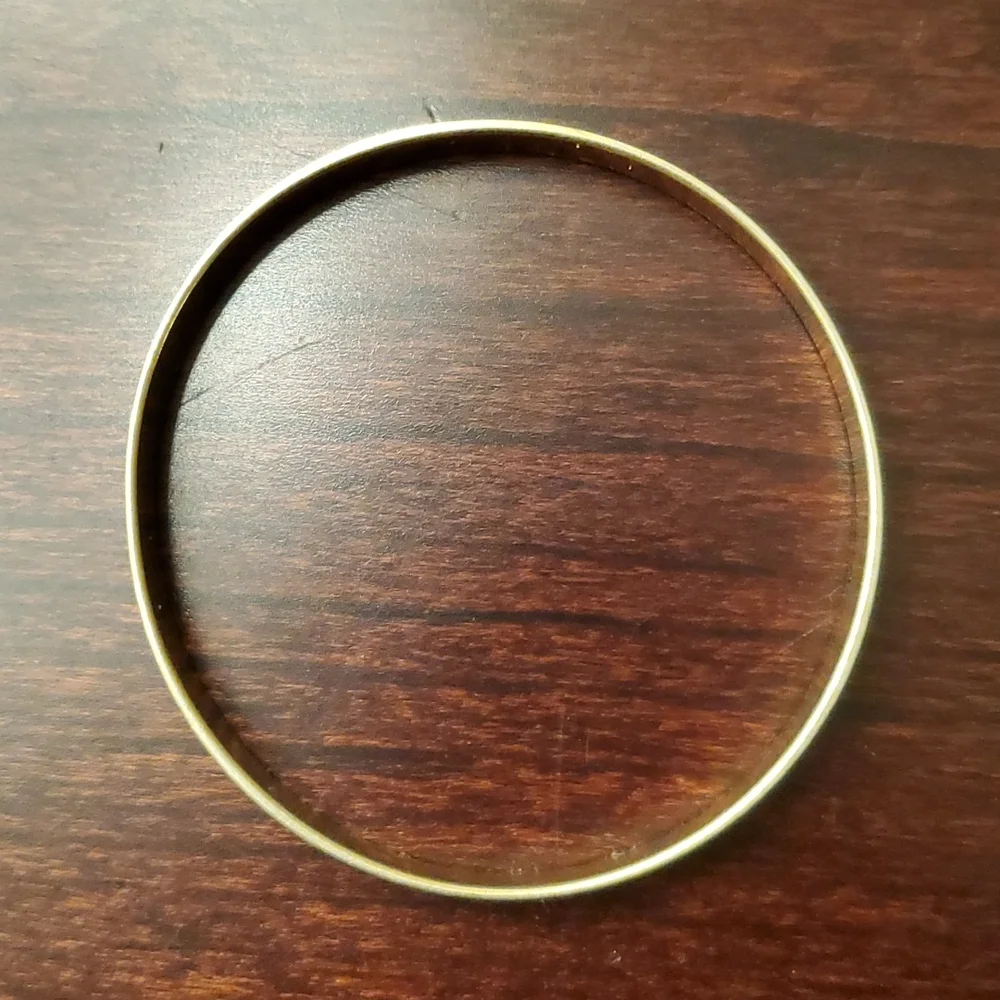 MONET Gold Tone Etched Bangle Bracelet